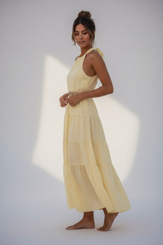 Shevibes soft yellow linen midi dress with halter neck and tiered skirt, perfect for summer.