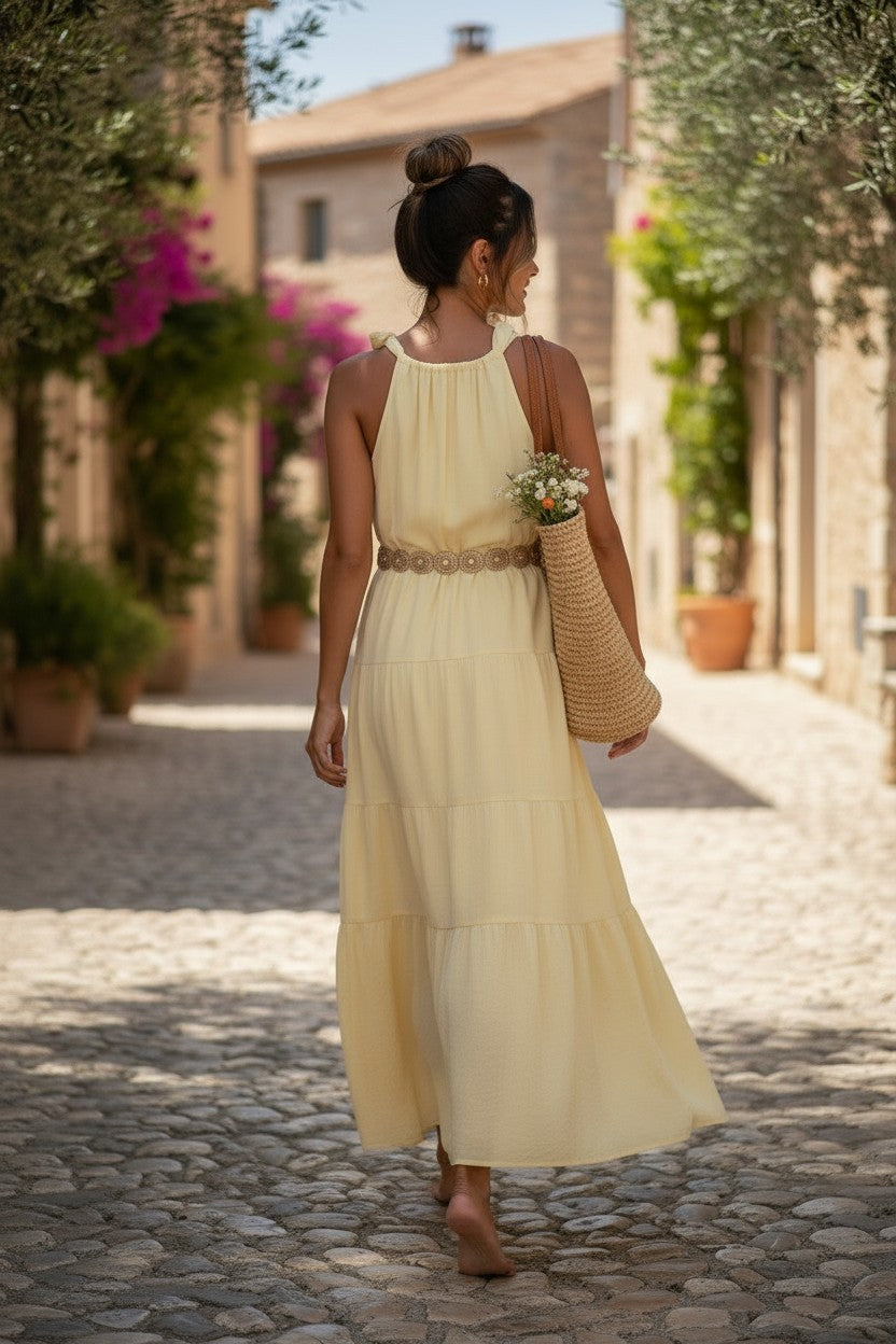 Shevibes soft yellow linen midi dress with halter neckline and tiered skirt, perfect for summer.